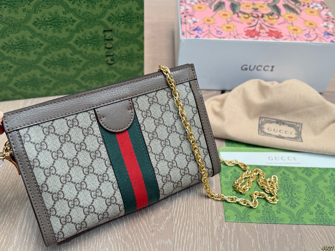 &yen;160飞机盒芯片版牛皮 原单专柜品质 夹子包 ｜Gucci Ophidia 夹子包 最新系列，链条包，配原版乌木色牛皮～这个款复古韵味特别浓，对版链条⛓，原版内里！上身效果也超赞，主要以精致特别的五金来提升整体质感。尺寸：26 17