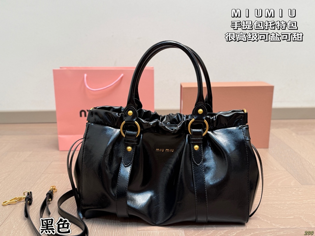 &yen;190 缪缪MIUMIU手提包 旅行出差旅游带它超方便 超级抢眼 爱了爱了 真是叫人无法抗拒 又美又能装！ 尺寸33 23
